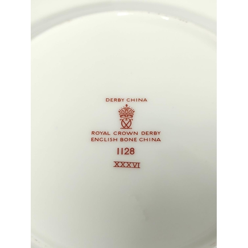 251 - Royal Crown Derby English bone china Imari shallow oval dish, No. 1128 with printed back stamp to un... 