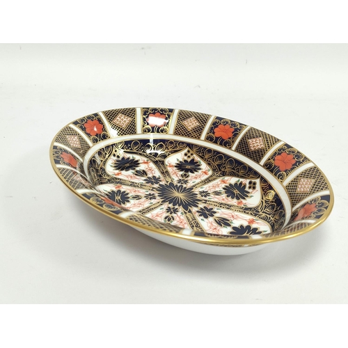 251 - Royal Crown Derby English bone china Imari shallow oval dish, No. 1128 with printed back stamp to un... 