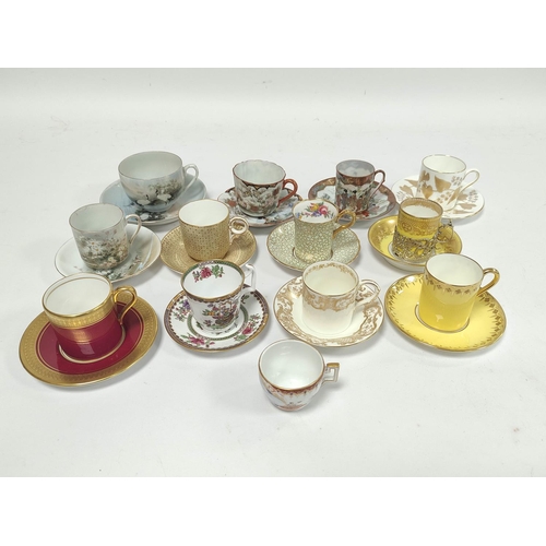 254 - Porcelain cabinet coffee cans with saucers to include an example by Cauldon with scroll silver liner... 