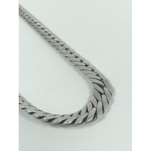 26 - 9ct white gold necklace of graduated close curb pattern, 14g. 