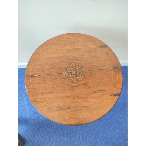 358 - Edwardian inlaid rosewood sewing table, the two section circular top opening to reveal a blue velour... 