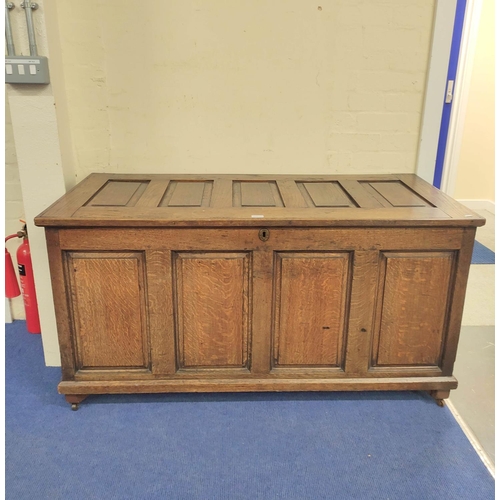 359 - Antique oak coffer with five panel hinged top, above four panel front, 75cm x 140cm x 63cm.