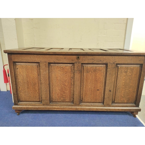 359 - Antique oak coffer with five panel hinged top, above four panel front, 75cm x 140cm x 63cm.