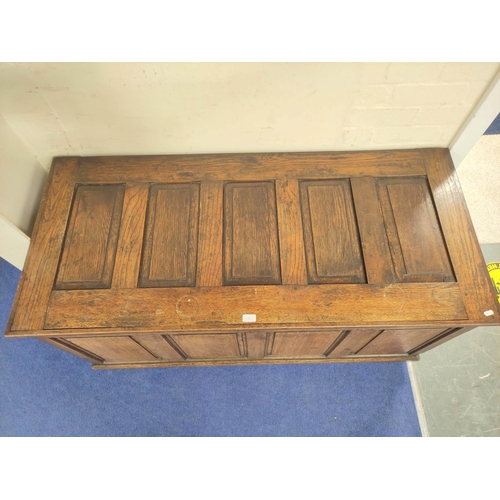 359 - Antique oak coffer with five panel hinged top, above four panel front, 75cm x 140cm x 63cm.