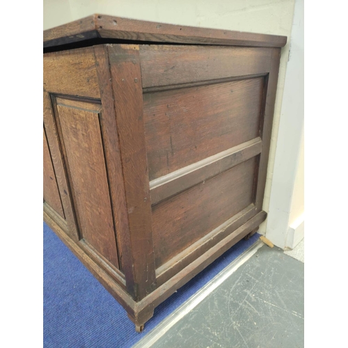 359 - Antique oak coffer with five panel hinged top, above four panel front, 75cm x 140cm x 63cm.