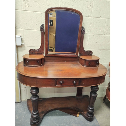 362 - Victorian mahogany bow front dressing table, with swing mirror above two small drawers with a furthe... 