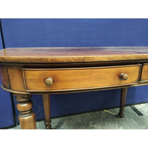 363 - Victorian mahogany side table (formerly an end section from a larger table), with D-end top above tw... 