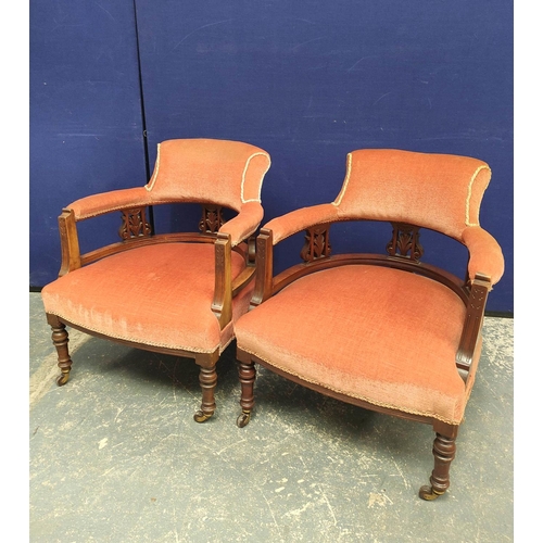 365 - Pair of Edwardian drawing room tub armchairs upholstered in later pink velour, raised on turned supp... 