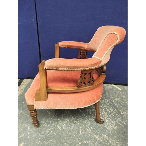 365 - Pair of Edwardian drawing room tub armchairs upholstered in later pink velour, raised on turned supp... 