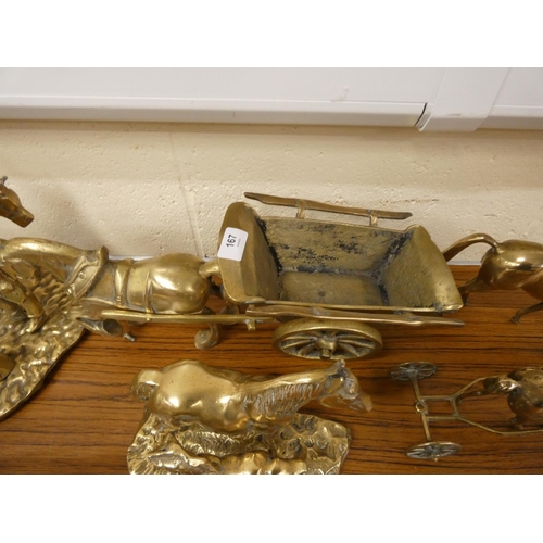 167 - Collection of brass horses and carts, also blacksmith figure.