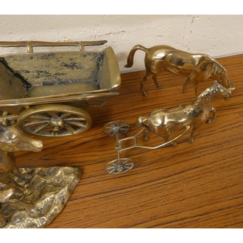 167 - Collection of brass horses and carts, also blacksmith figure.