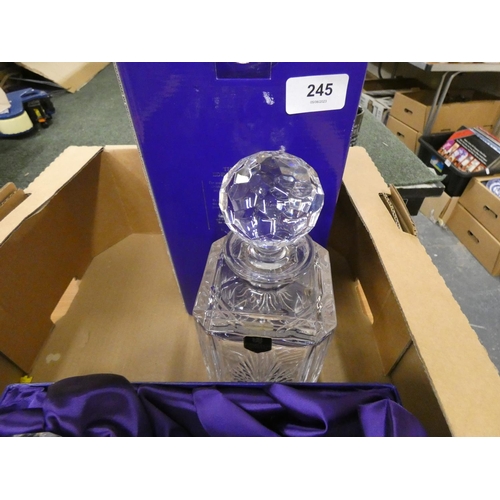 245 - Two boxed Edinburgh Crystal decanters.