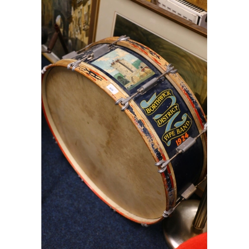 406 - Borthwick District Pipe Band 1924 drum with painted illustration of Borthwick Castle, 78cm diameter.