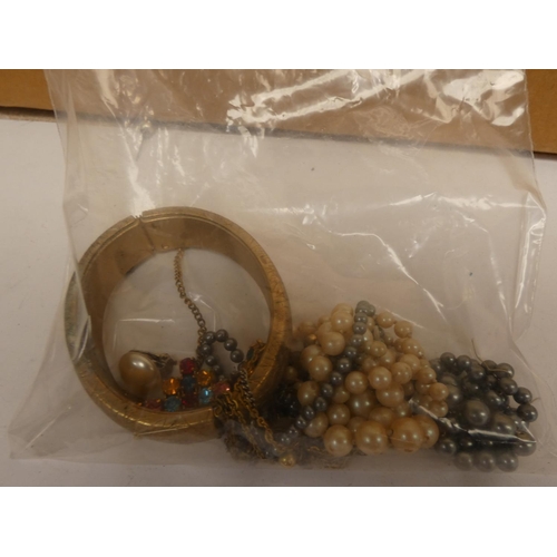 341 - Costume jewellery to include simulated pearls, bangle, etc.