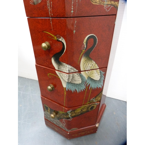 459 - Red lacquer octagonal chest of eight graduated drawers.