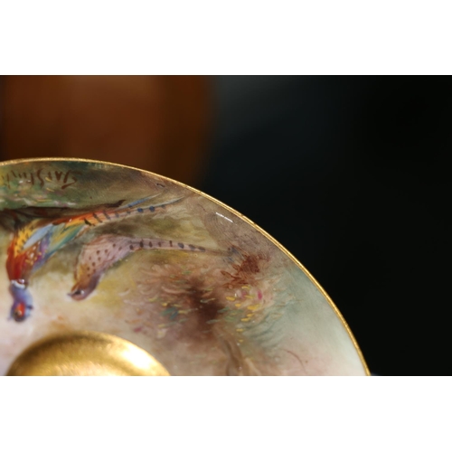 504 - Royal Worcester porcelain cabinet cup and saucer decorated with pheasant design and signed 'Jas Stin... 