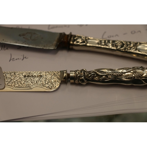 67E - Victorian silver corn on the cob knife with serrated back and leaf decorated blade on handle with co... 