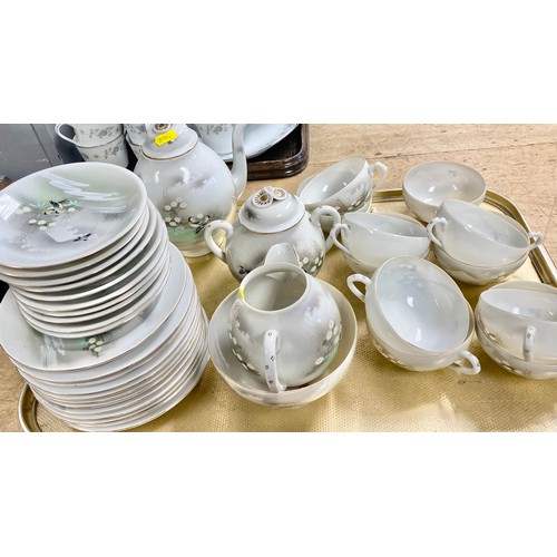 284 - Noritake tea/dinner service, also an eggshell tea set