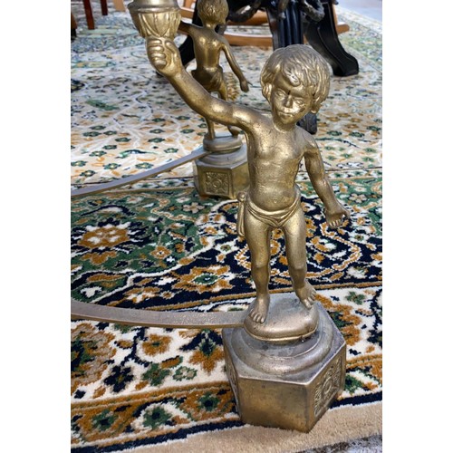 546 - Marble topped  occasional table on brass cherubs 118 x 46 x 50