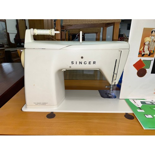 Singer sewing machine model no 6790 with table