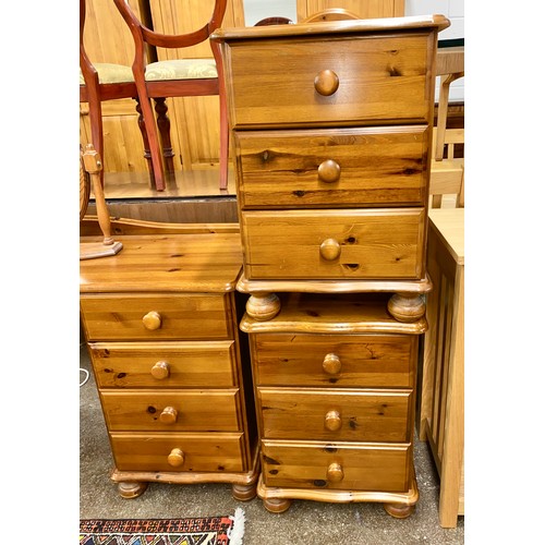 562 - Pine bedroom suite comprising dressing table with cheval mirror, two over four chest of drawers, and... 