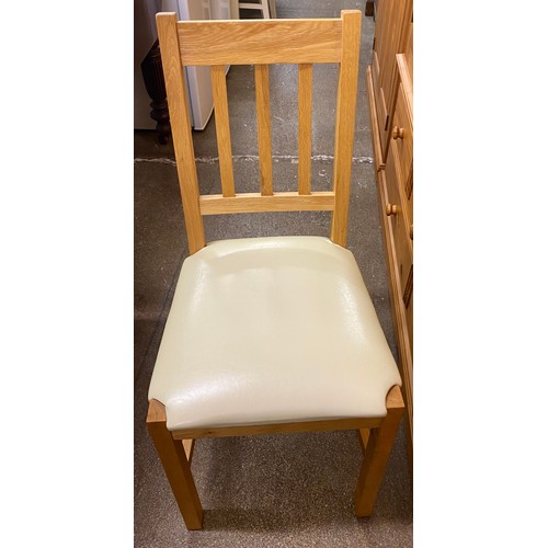 576 - Contemporary oak dining table with six chairs 