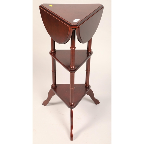 406 - Mahogany three sided drop-leaf side table/plant stand with two shelves (32cm d, 74cm h)