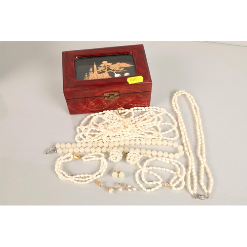 108 - Japanese cork scene jewellery box containing assortment of costume jewellery and pearl necklaces