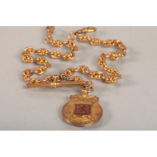 86 - 9ct gold watch chain with attached 9ct Birmingham gold medallion engraved 