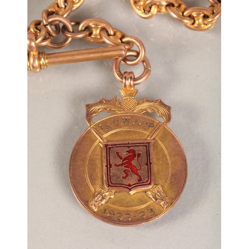 86 - 9ct gold watch chain with attached 9ct Birmingham gold medallion engraved 