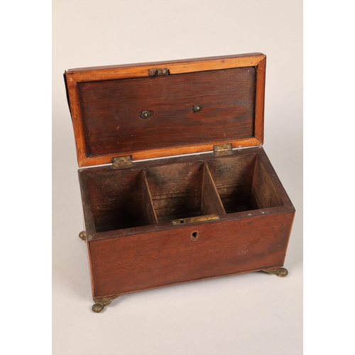 201 - A 19th C mahogany rectangular tea caddy raised on brass supports