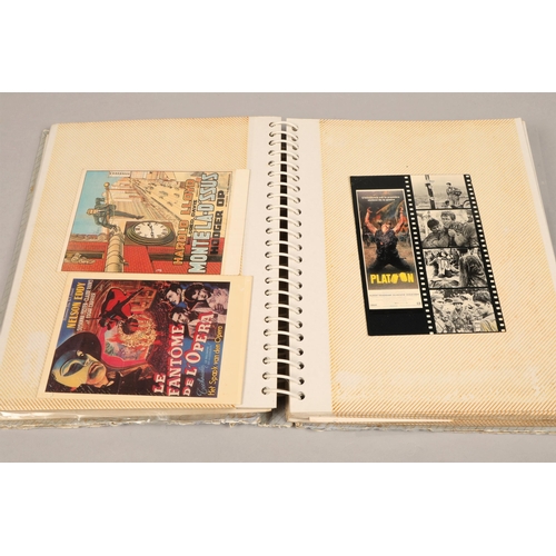 205 - Album containing film and screen post cards to include Charlie Chaplin, Ingrid Bergman, Clark Gabel ... 