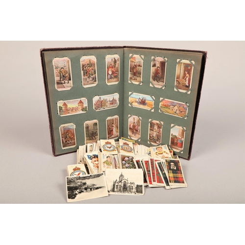 217 - Album containing cigarette cards, to include Britain's Defenders part set, Sports Favourites, and ot... 