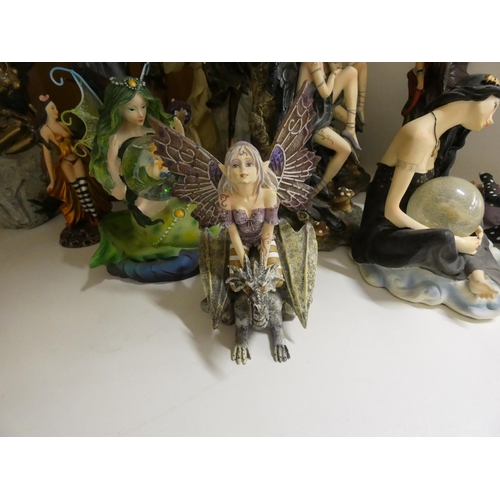 418 - Large collection of Fairy ornaments, including some larger sized.