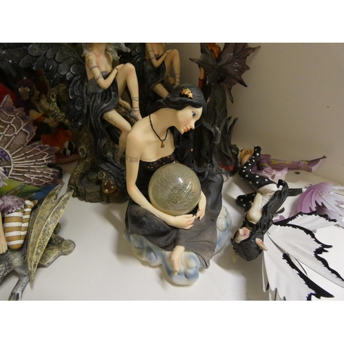 418 - Large collection of Fairy ornaments, including some larger sized.