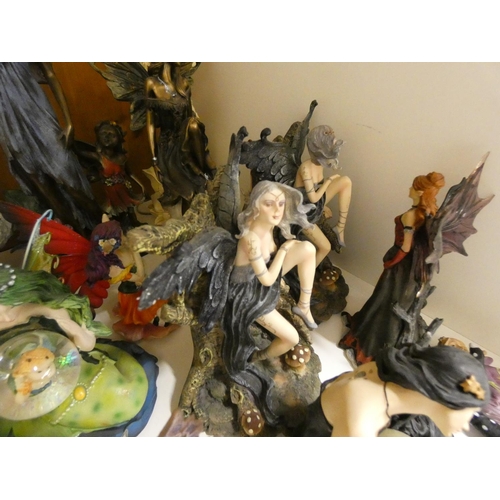 418 - Large collection of Fairy ornaments, including some larger sized.