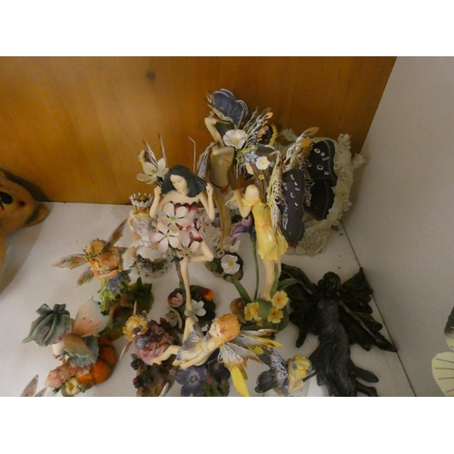 423 - Collection of resin Fairy ornaments including Leonardo.