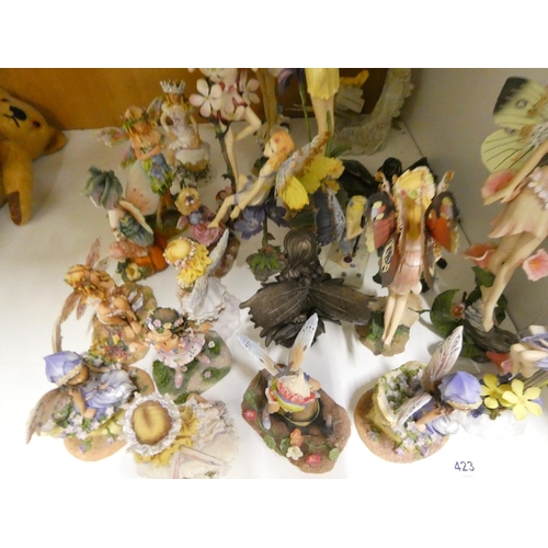 423 - Collection of resin Fairy ornaments including Leonardo.