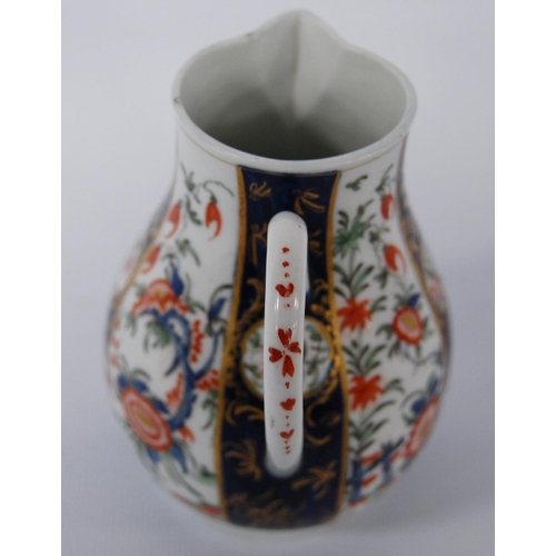 250 - 18th century first period Worcester Imari sparrow beak baluster cream jug, with all over Imari flora... 