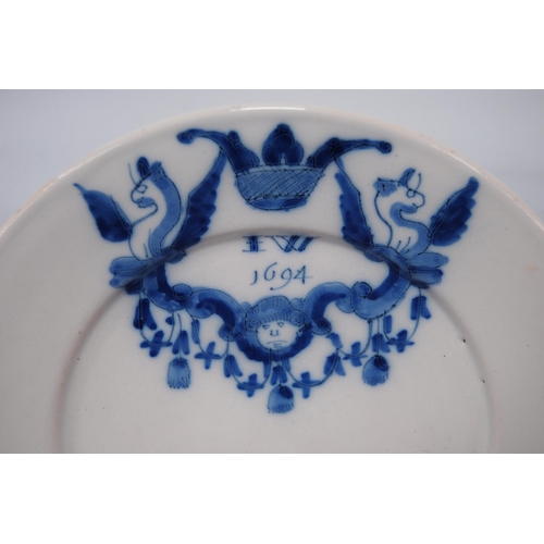 260 - 17th century William & Mary period English blue and white Delft plate with blue underglazed crow... 