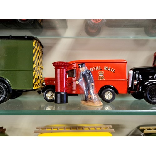 497 - Collection of die cast vehicles including vintage and modern Royal Mail delivery vans in glass front... 