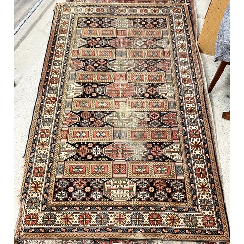 606 - Four various middle eastern rugs/ carpets (4)