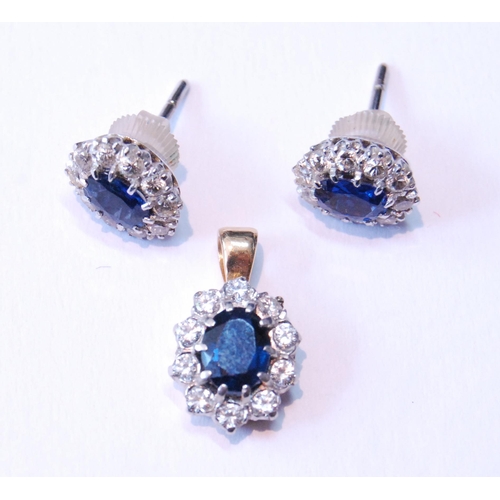 124 - Pair of sapphire and diamond cluster earrings, unmarked, probably white gold, with central oval-cut ... 