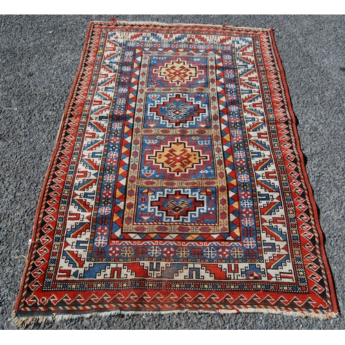 356 - Antique Turkish hand-knotted rug with four geometric medallions to the centre within all over geomet... 