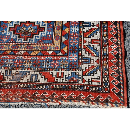 356 - Antique Turkish hand-knotted rug with four geometric medallions to the centre within all over geomet... 