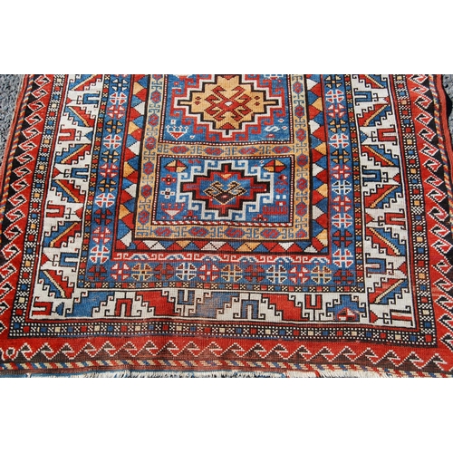 356 - Antique Turkish hand-knotted rug with four geometric medallions to the centre within all over geomet... 