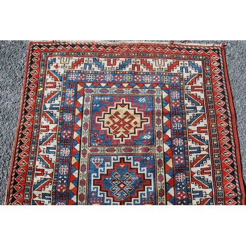 356 - Antique Turkish hand-knotted rug with four geometric medallions to the centre within all over geomet... 