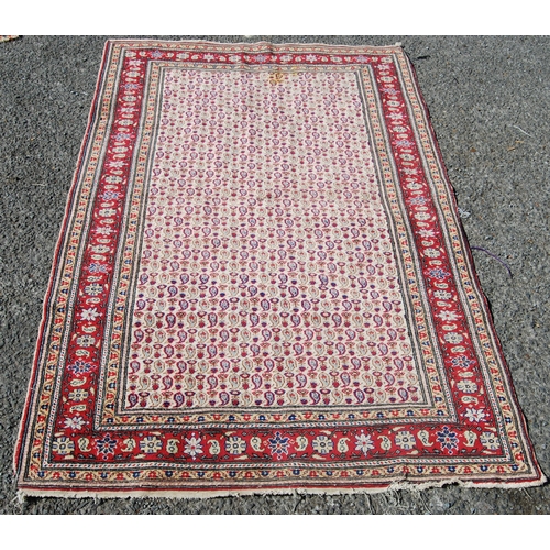 357 - Antique Turkish hand-knotted rug with all over floral and geometric motifs, on a red, blue and cream... 