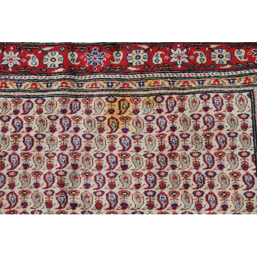 357 - Antique Turkish hand-knotted rug with all over floral and geometric motifs, on a red, blue and cream... 