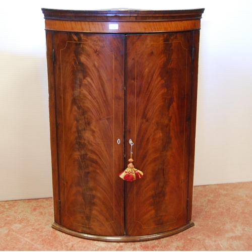 406 - George III inlaid mahogany corner cupboard, c. late 18th/early 19th century, with two doors enclosin... 